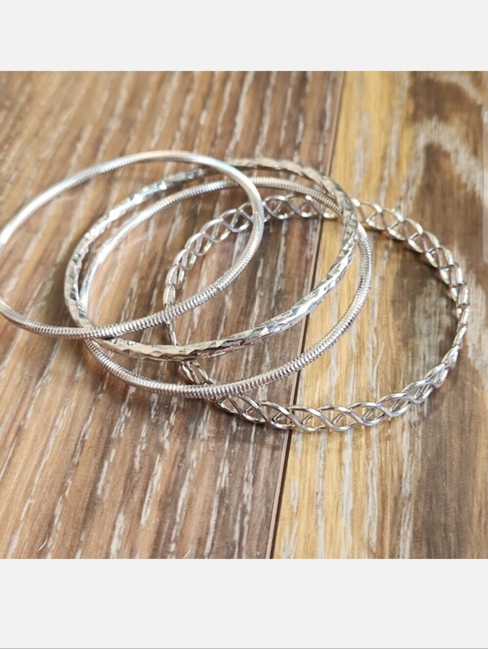 Set of 4 Silver Bangle Bracelets Swirl Twist